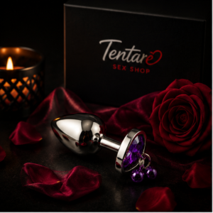 Joya anal con forma de corazón violeta y cascabeles